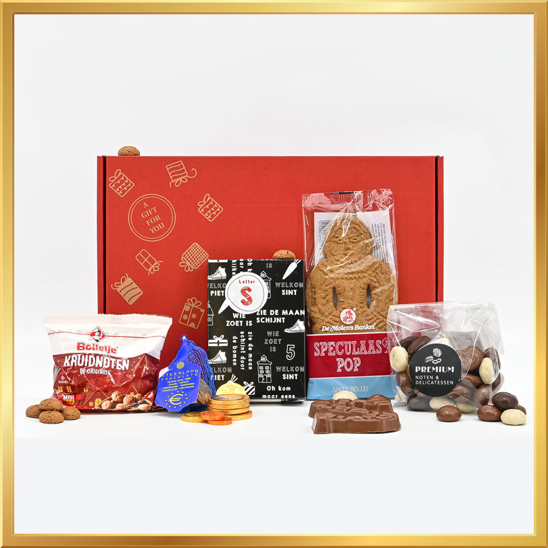 Sinterklaas pakket met een melkchocolade letter S UTZ, Bolletje kruidnoten, gemengde chocoladekruidnoten, chocolade munten, Sint schuimpjes en een banket speculaaspop, ideaal voor het vieren van Sinterklaas.